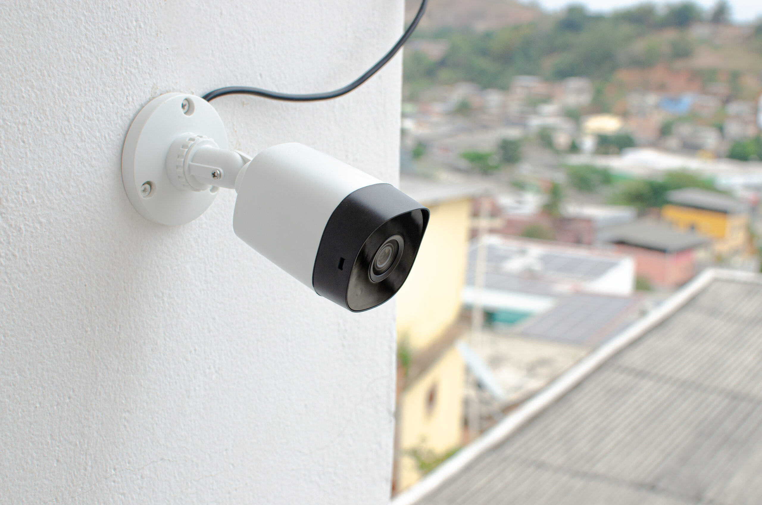 Video Camera CCTV, CFTV security camera, white wall camera, safely recording the external environment in a busy place. Safe circuit, theft protection. Surveillance view.